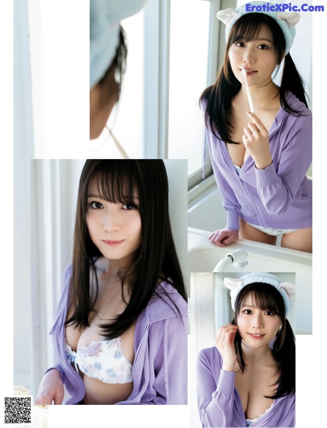 A woman in a purple shirt is brushing her teeth.